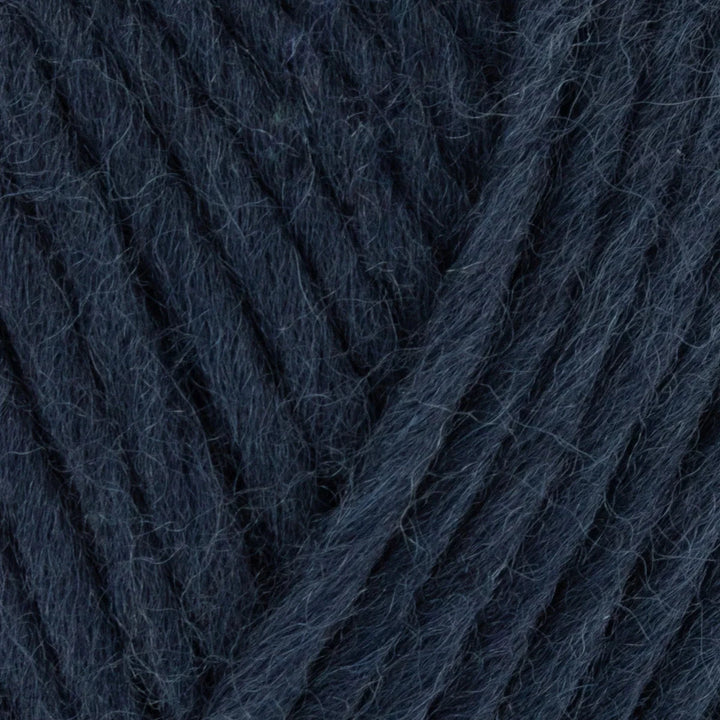 Close-up of dark blue yarn with a textured pattern