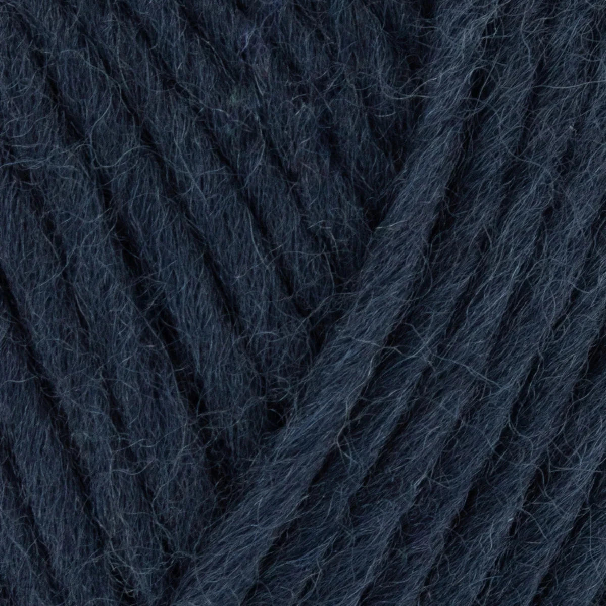 Close-up of dark blue yarn with a textured pattern