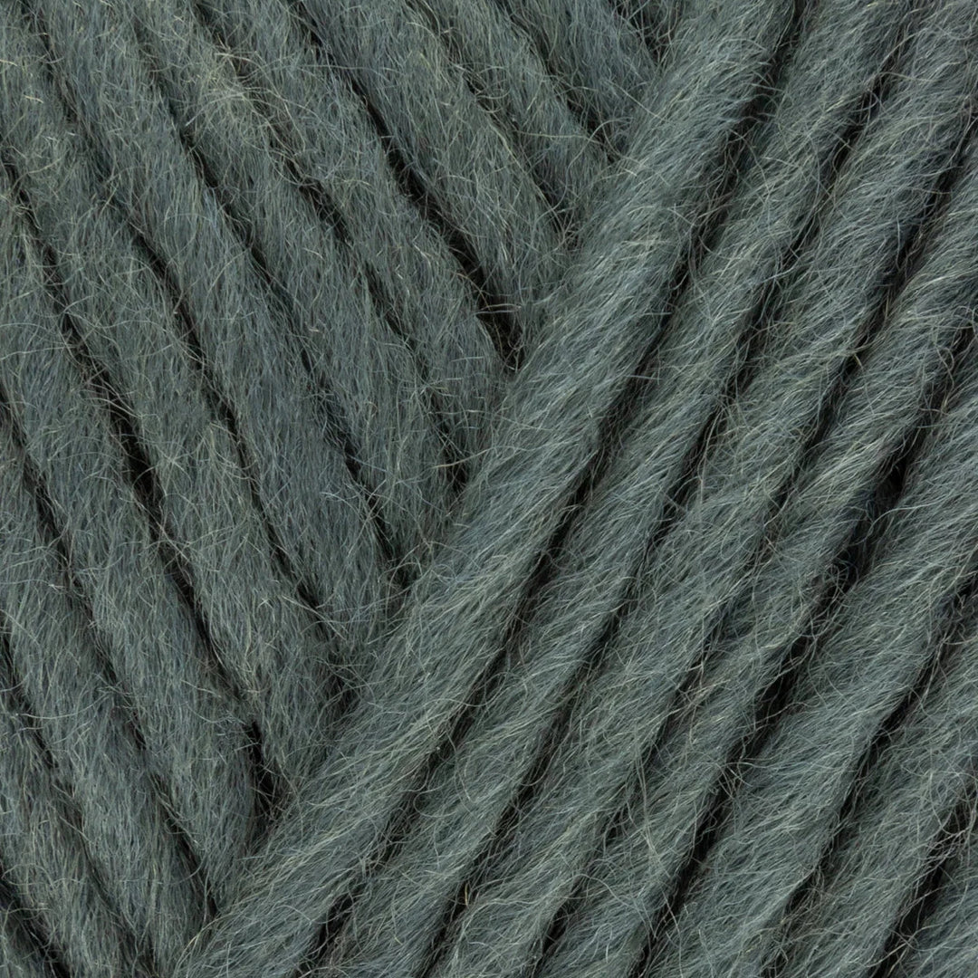 Close-up of gray yarn with a textured pattern