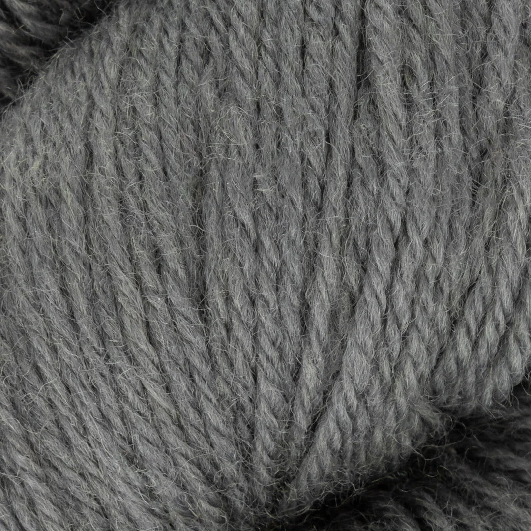 Close-up of gray yarn with a textured pattern