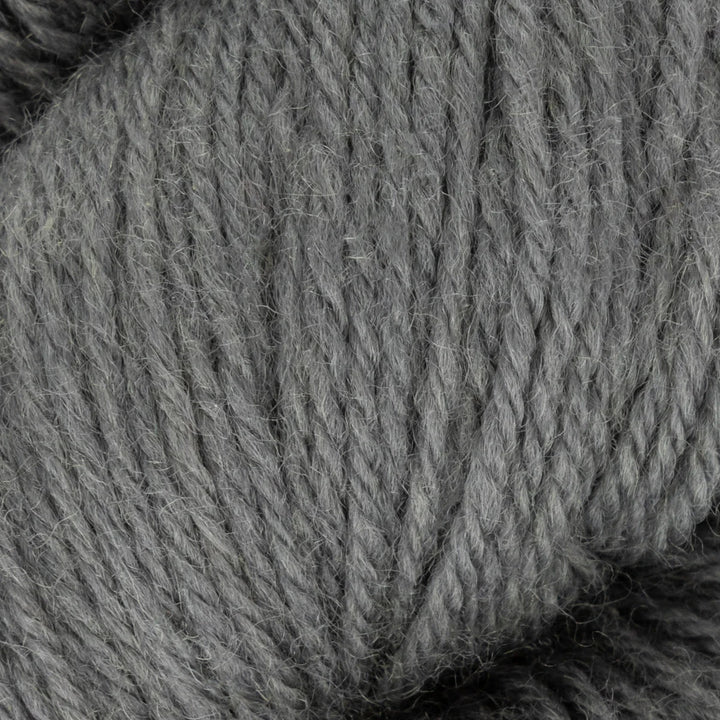 Close-up of gray yarn with a textured pattern