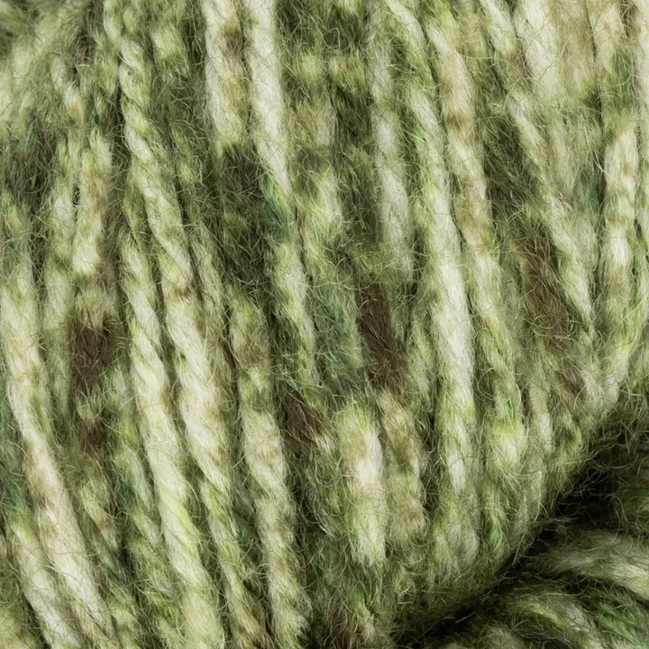Close-up of green and beige yarn