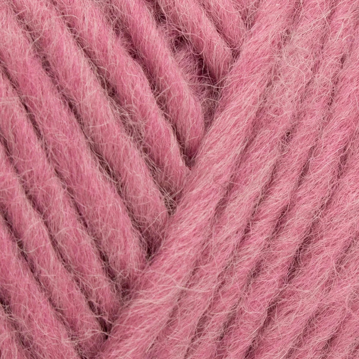 Close-up of pink yarn with visible texture