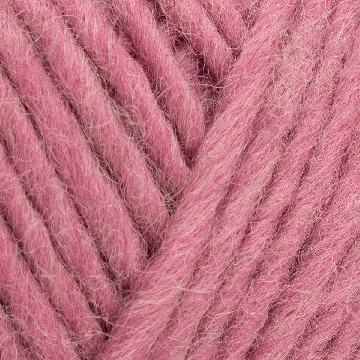 Close-up of pink yarn with visible texture