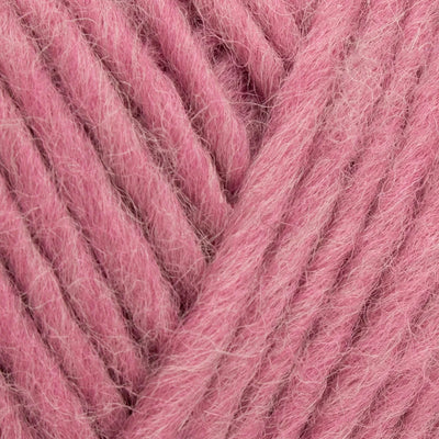 Close-up of pink yarn with visible texture